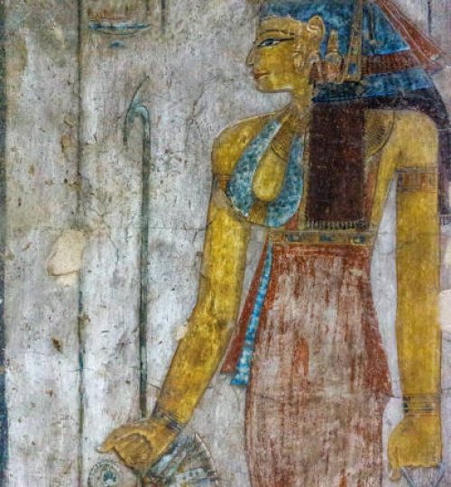 Ancient egypt color image of Egyptian Queen Cleopatra on wall of temple